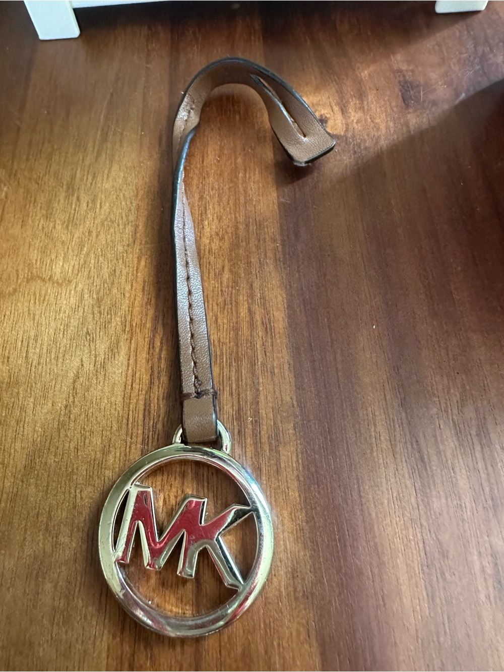 Michael Kors Brown Leather Strap Keyring with Gold MK Emblem and Red Inset